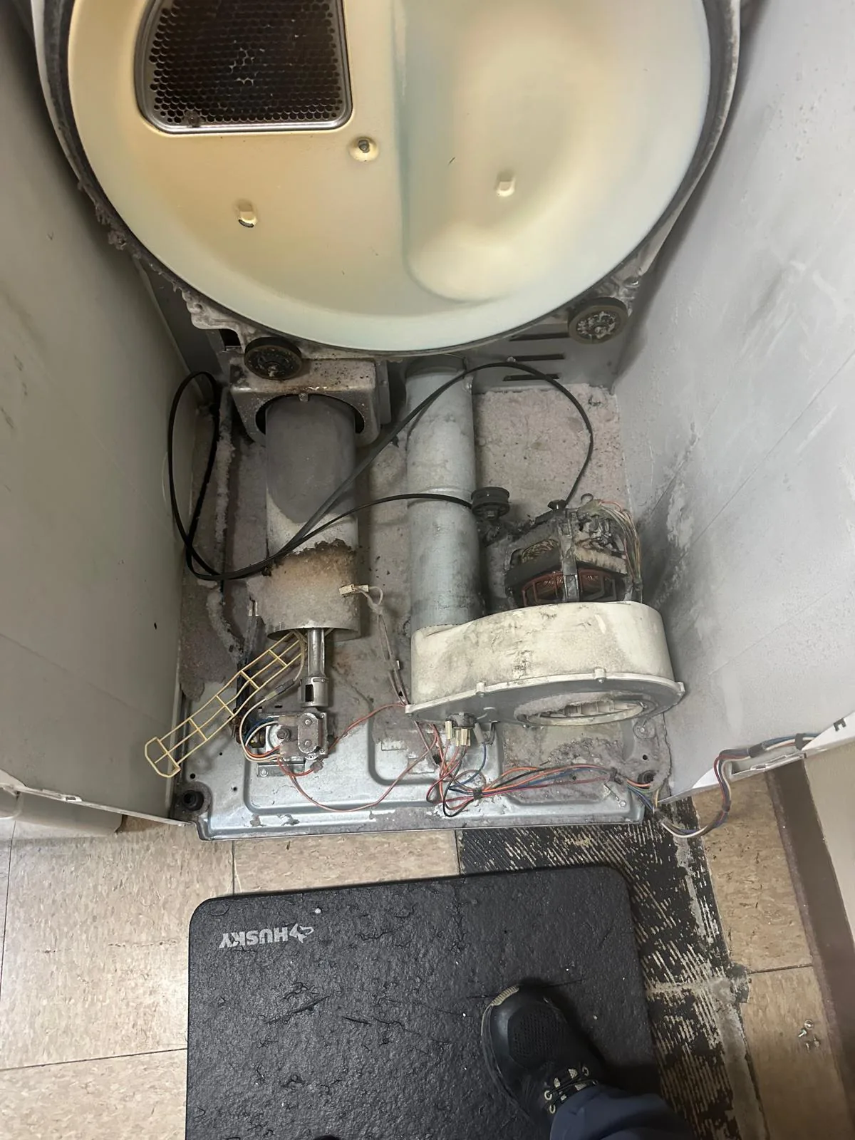 Commercial coin-operated gas dryer before repair and service