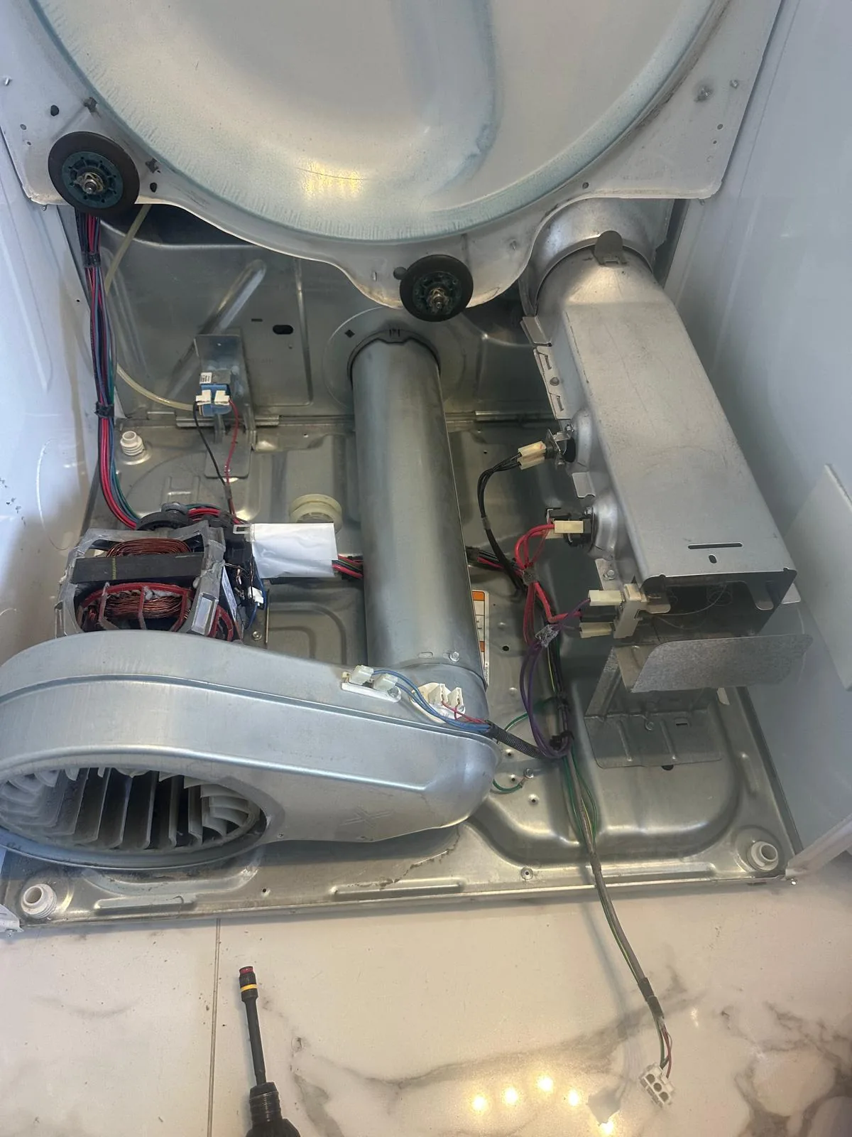 Dryer interior clean with serviced heating element after deep cleaning