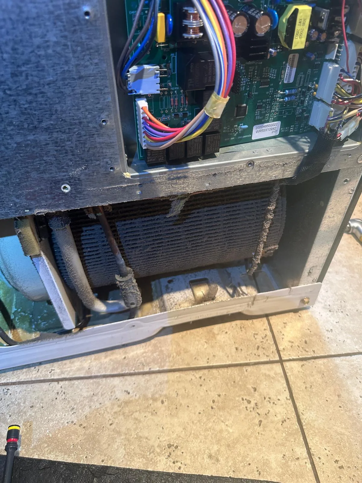 GE refrigerator rear panel before service