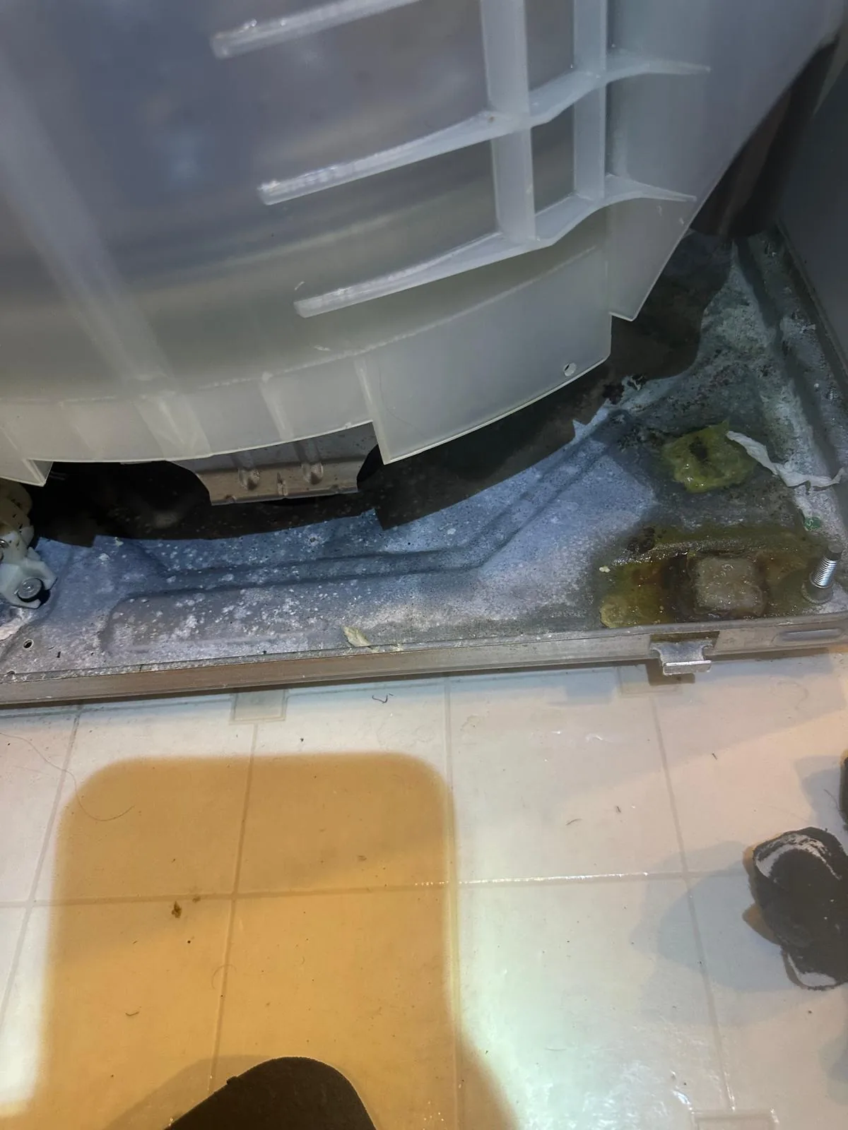 GE washer tub and base inspected while unit was opened for service