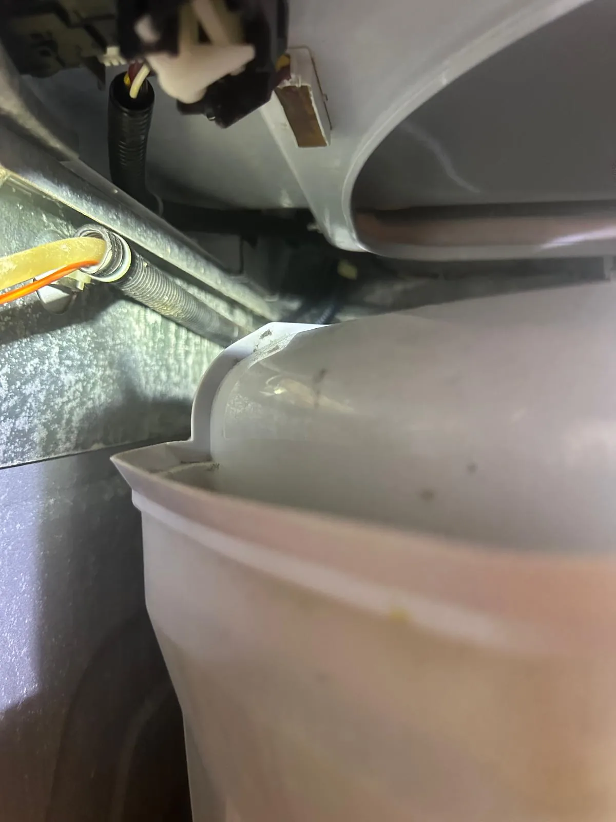 GE washer lid switch area and wiring checked during repair