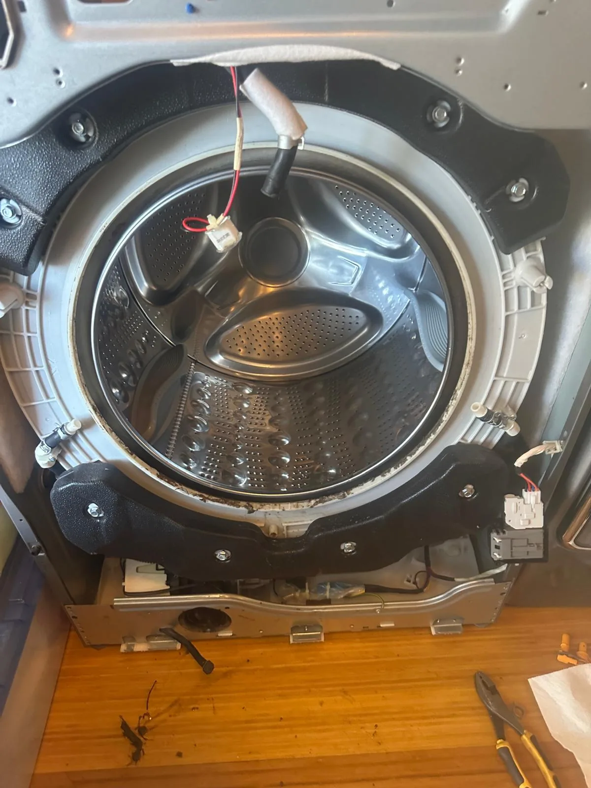 Kenmore washer drum exposed with worn door boot seal removed